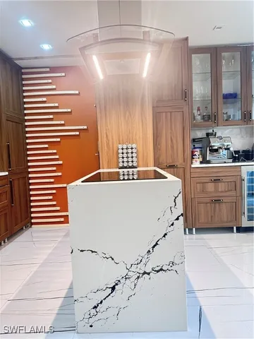 a kitchen with a cabinets and appliances