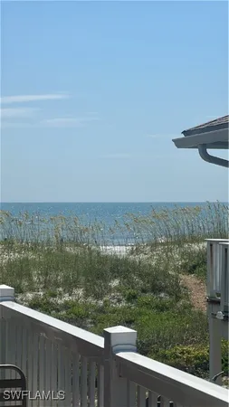 a view of a lake from a balcony