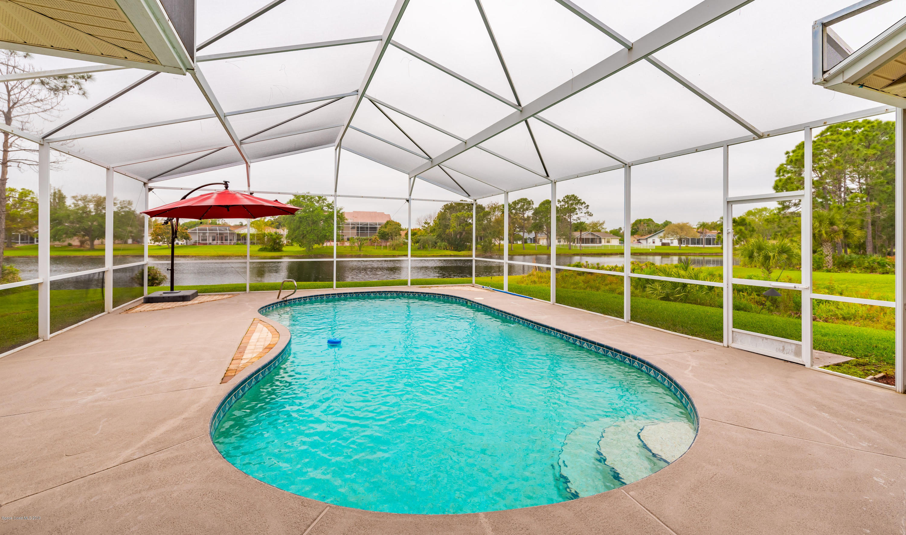 4474 Long Lake Road Melbourne, FL 32934 - Photo 3 of 48 4474LongLakeStaged(167of227)-HDR