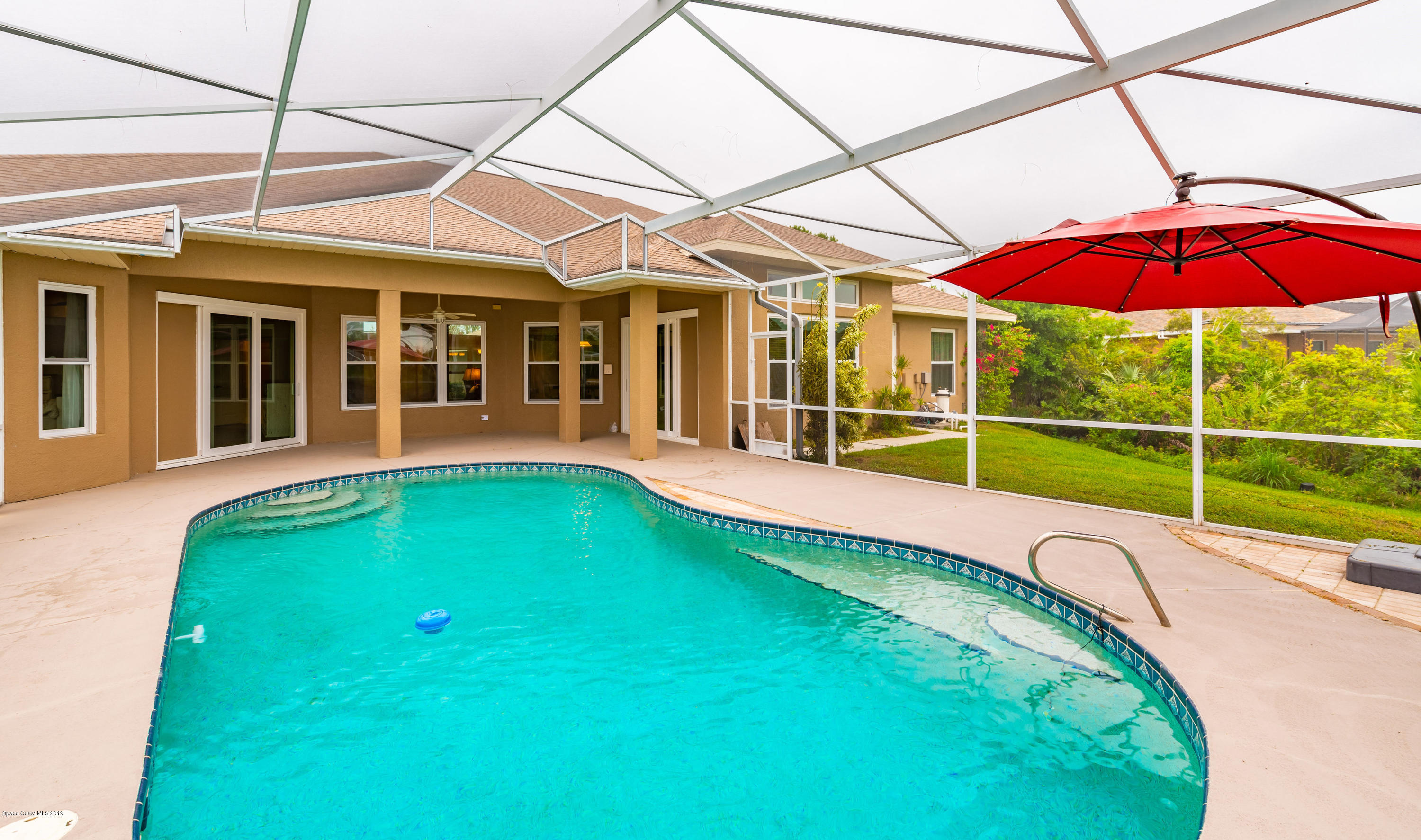 4474 Long Lake Road Melbourne, FL 32934 - Photo 4 of 48 4474LongLakeStaged(175of227)-HDR