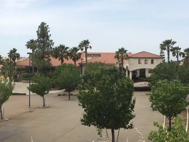 a picture of houses with outdoor space and trees