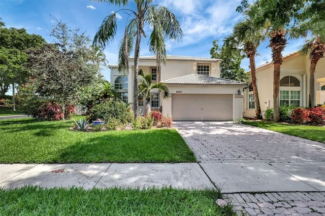 $660,000 | 6042 Branchwood Drive, Lake Worth, FL 33467