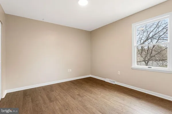 a view of a room that has a window in it