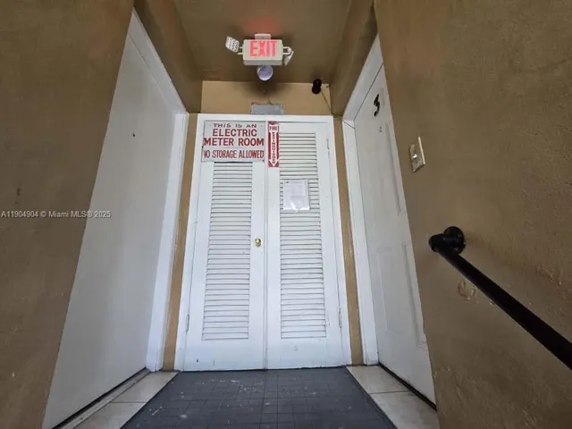 a view of an entryway with a stairs