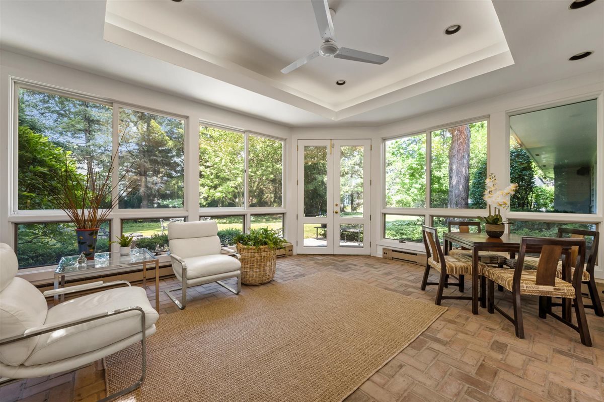 356 Sheridan Road Glencoe, IL 60022 - Photo 12 of 33 a living room with furniture and large windows