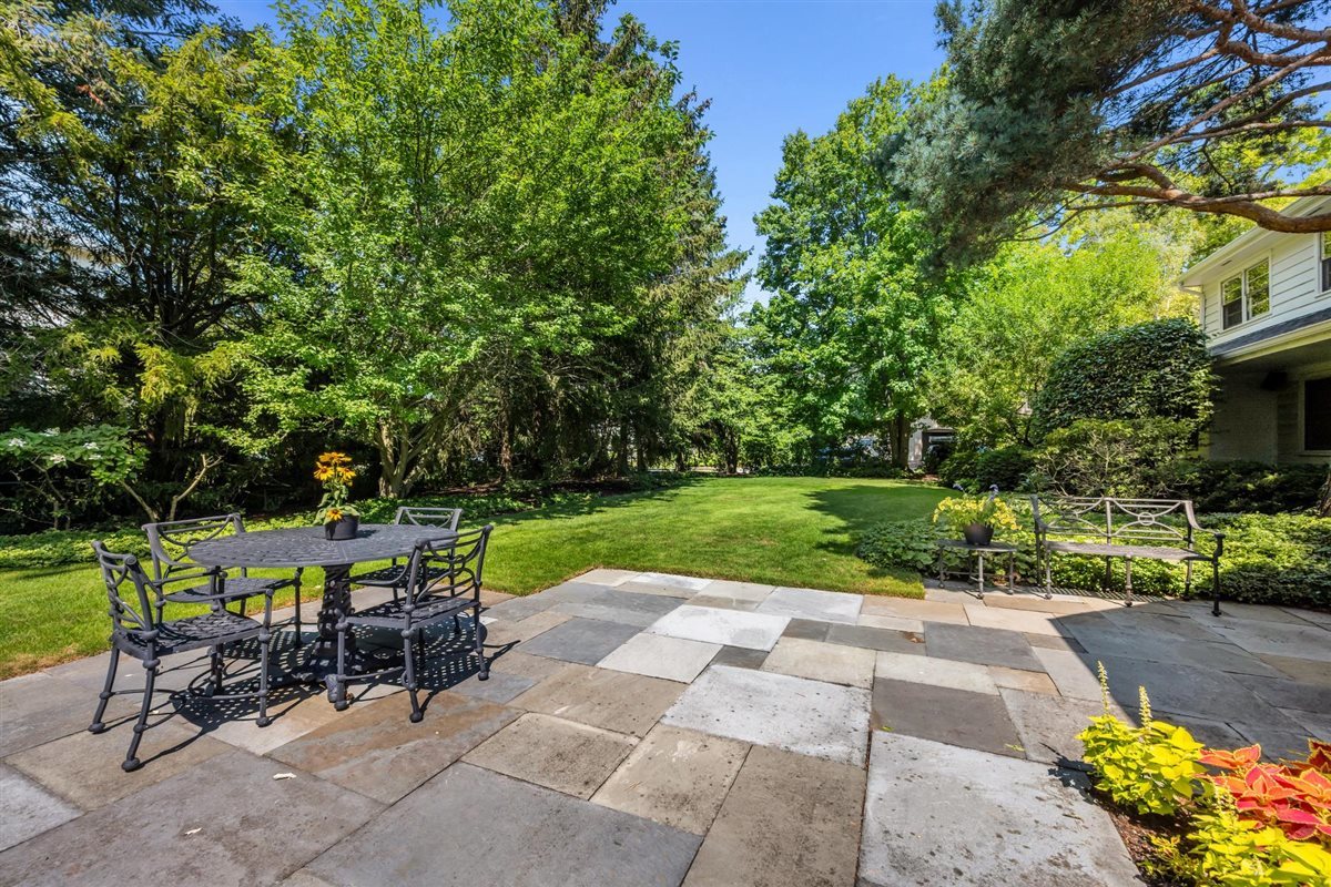 356 Sheridan Road Glencoe, IL 60022 - Photo 29 of 33 a view of backyard with seating area and green space