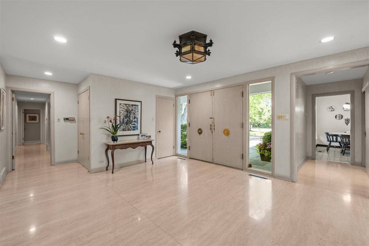 356 Sheridan Road Glencoe, IL 60022 - Photo 3 of 33 a view of a livingroom with furniture and a window