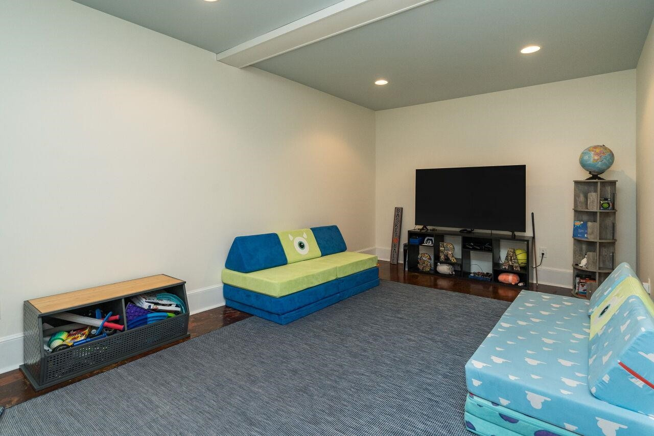 1621 Lorraine Road Raleigh, NC 27607 - Photo 23 of 28 Finished basement with endless possibilities!