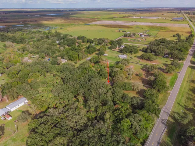 a view of a back yard of a building with a sink