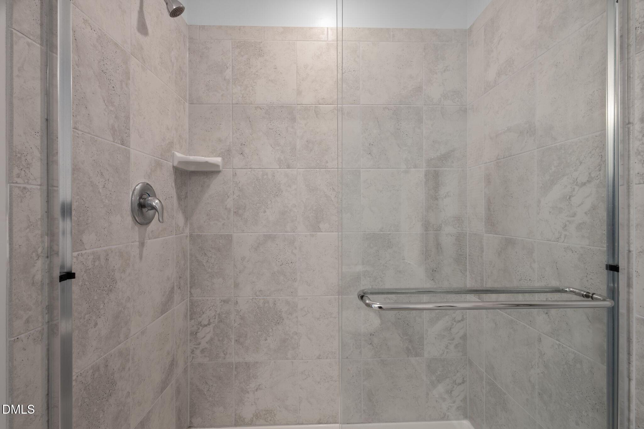 17 Rambler Lane Morrisville, NC 27560 - Photo 25 of 50 a bathroom with a shower