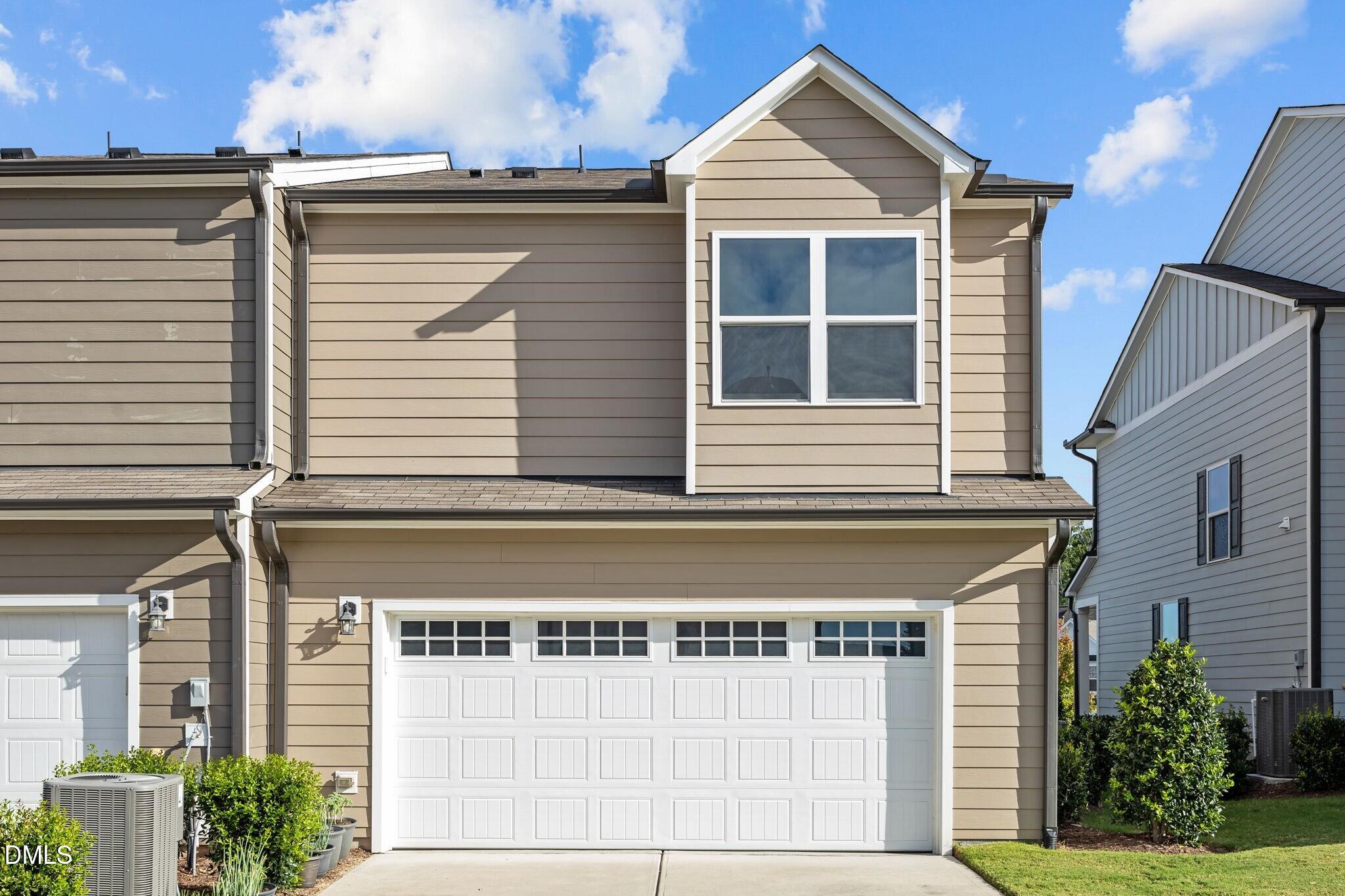 17 Rambler Lane Morrisville, NC 27560 - Photo 33 of 50 a view of a house with a yard and balcony