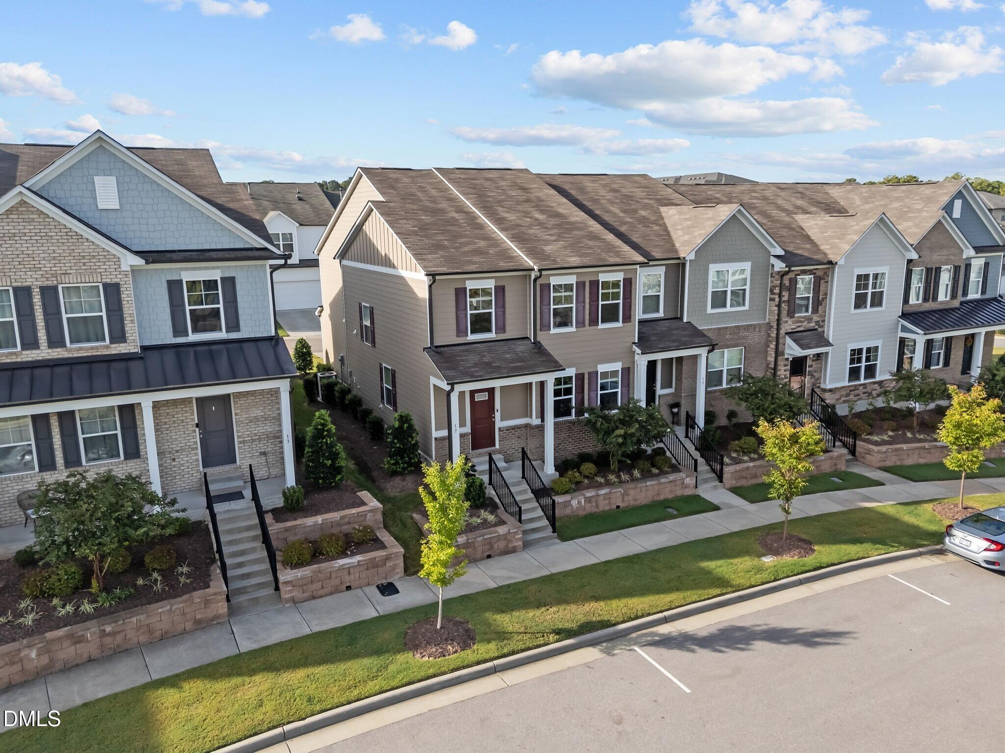 17 Rambler Lane Morrisville, NC 27560 - Photo 38 of 50 a view of multiple houses with a yard