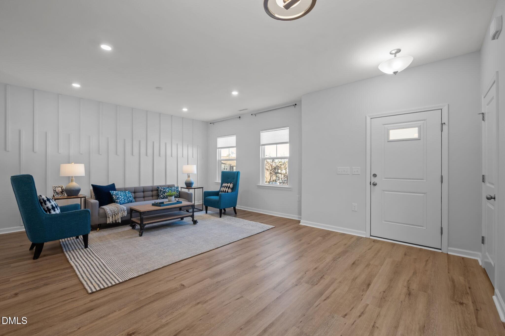 17 Rambler Lane Morrisville, NC 27560 - Photo 6 of 50 a living room with furniture and wooden floor