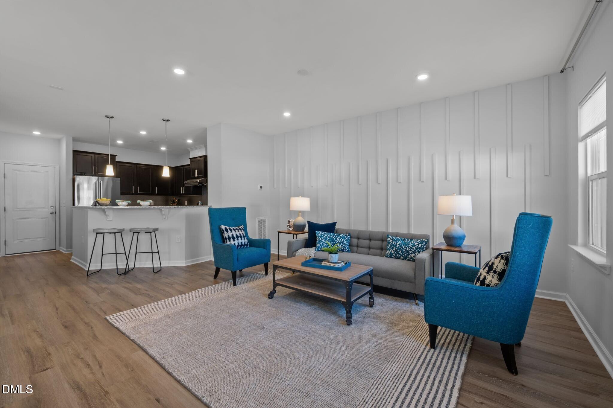 17 Rambler Lane Morrisville, NC 27560 - Photo 8 of 50 a living room with furniture and wooden floor
