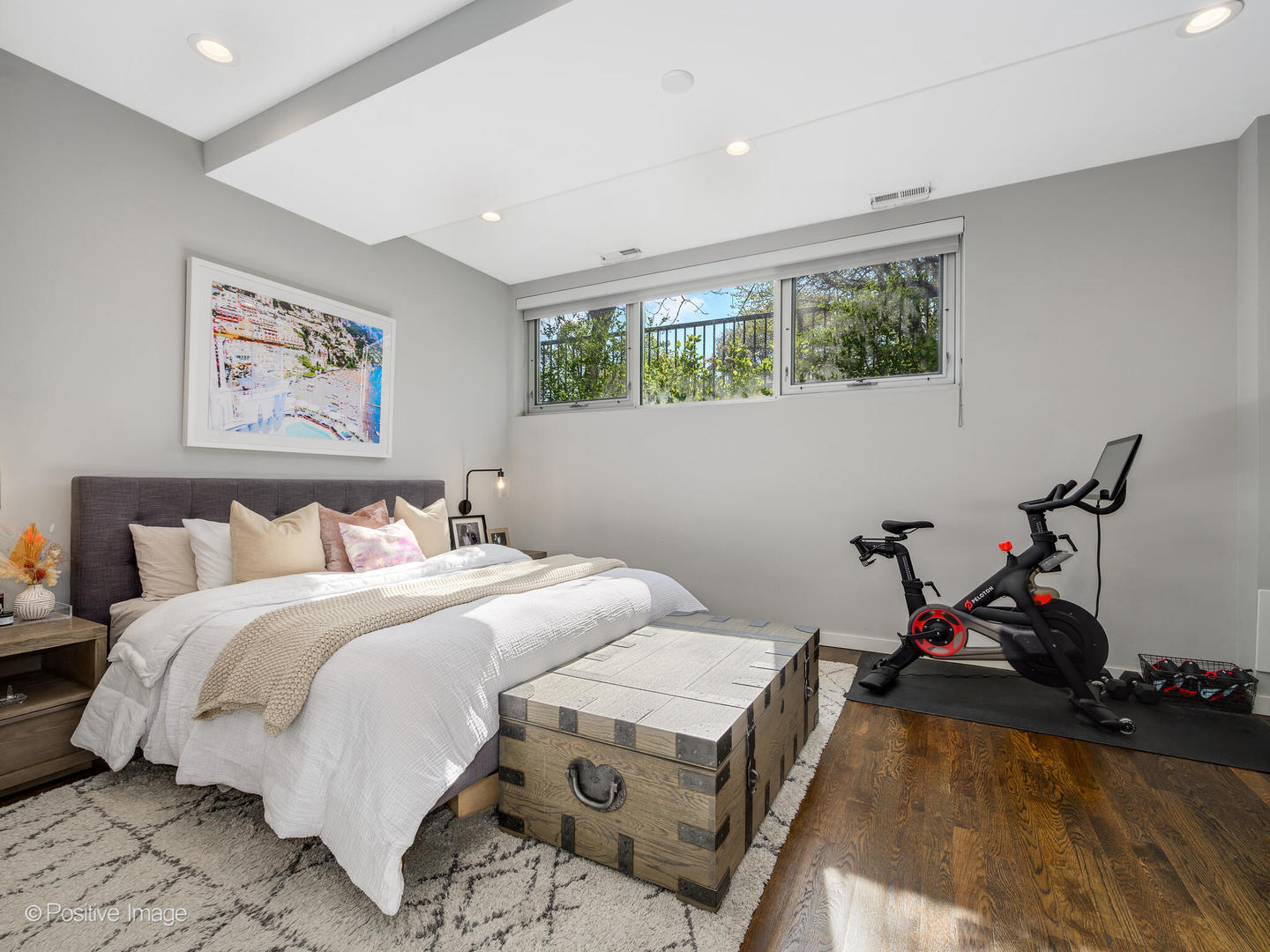 2235 North Oakley Avenue, Unit 1 Chicago, IL 60647 - Photo 18 of 27 a bedroom with a bed and wooden floor