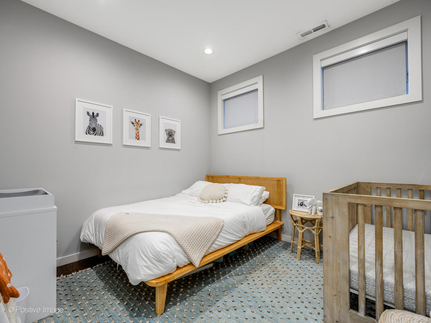 2235 North Oakley Avenue, Unit 1 Chicago, IL 60647 - Photo 22 of 27 a bedroom with a bed and a window