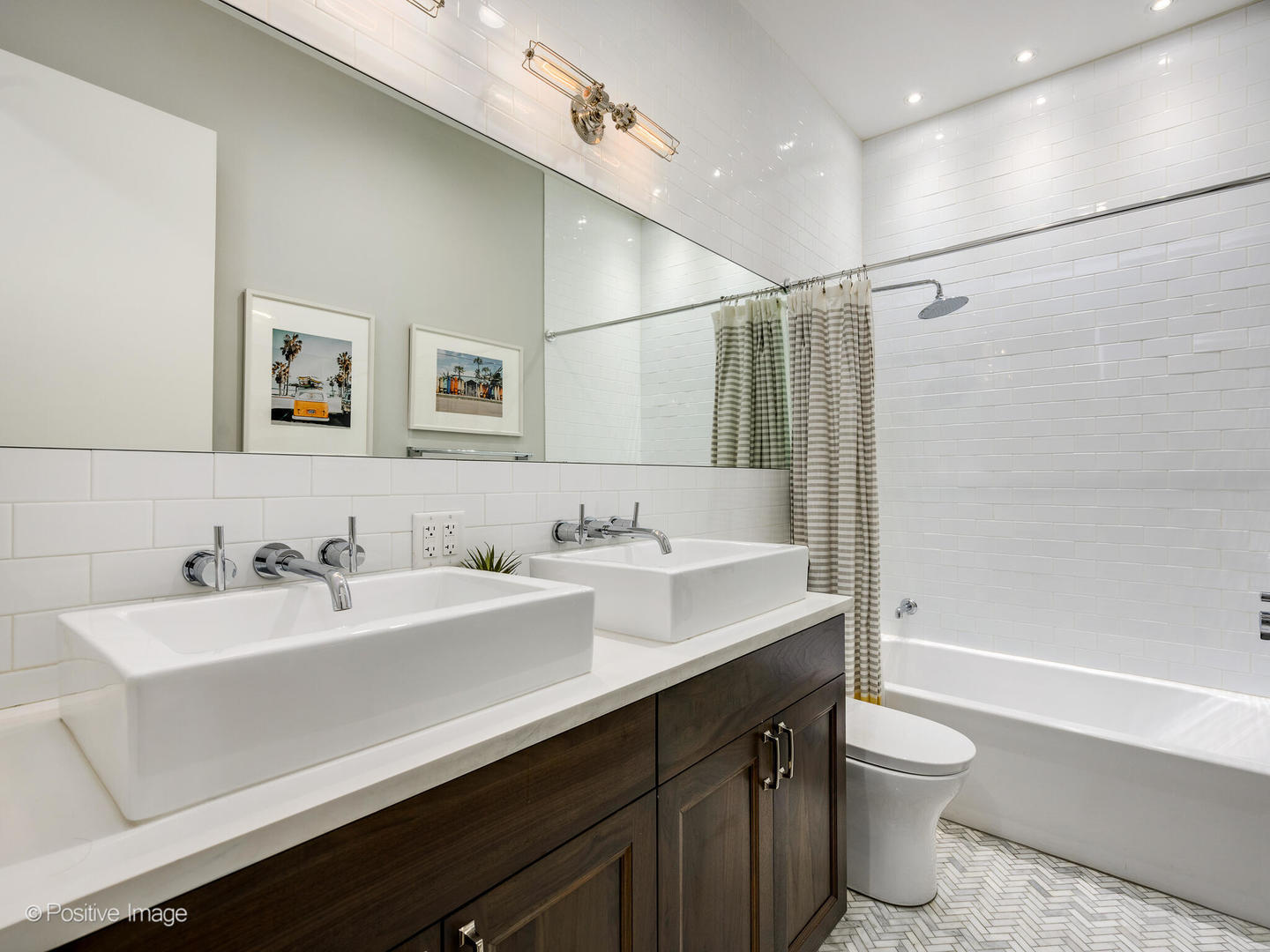 2235 North Oakley Avenue, Unit 1 Chicago, IL 60647 - Photo 23 of 27 a bathroom with a sink a toilet and shower