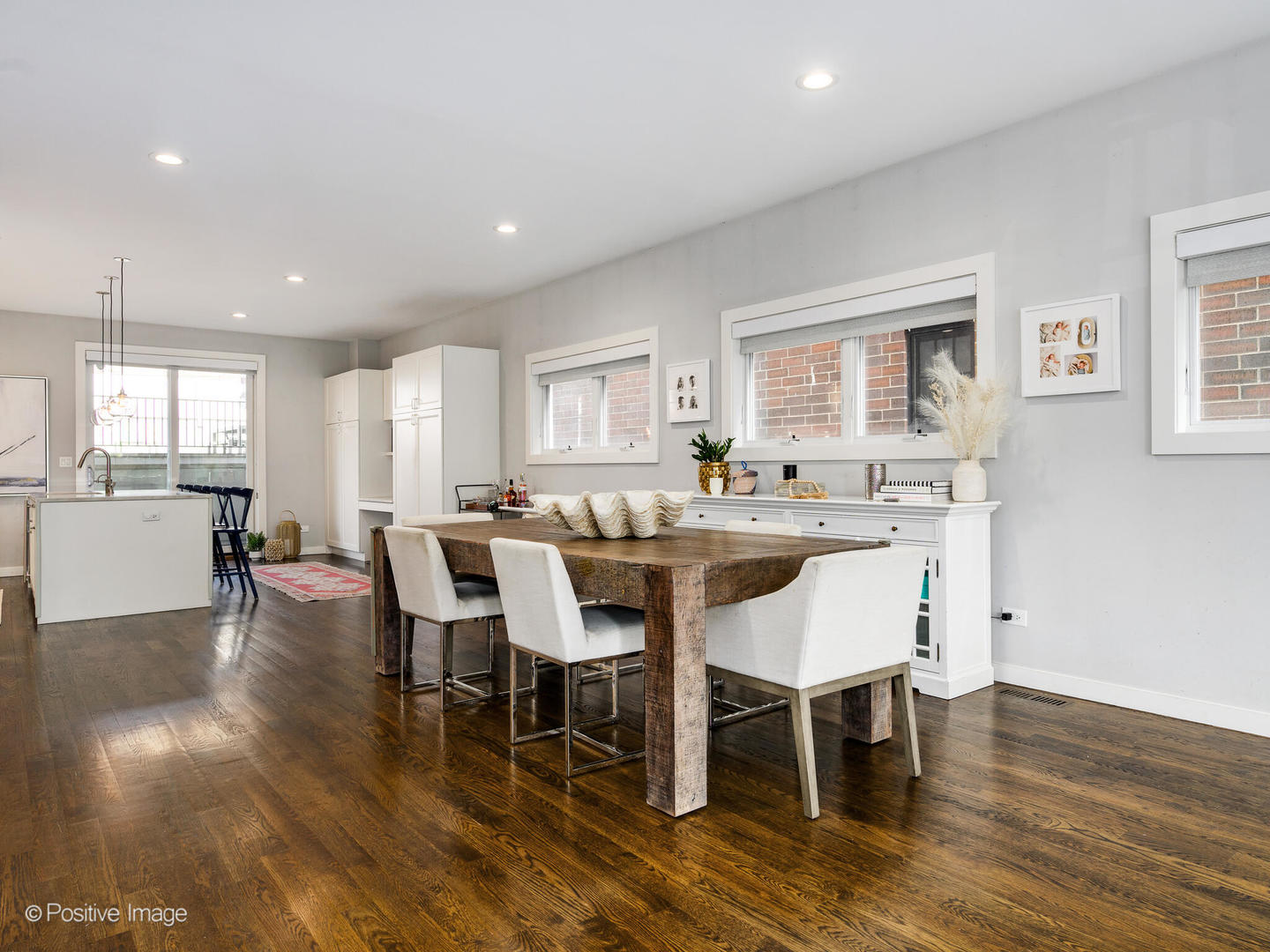 2235 North Oakley Avenue, Unit 1 Chicago, IL 60647 - Photo 7 of 27 a view of a dining room with furniture and wooden floor
