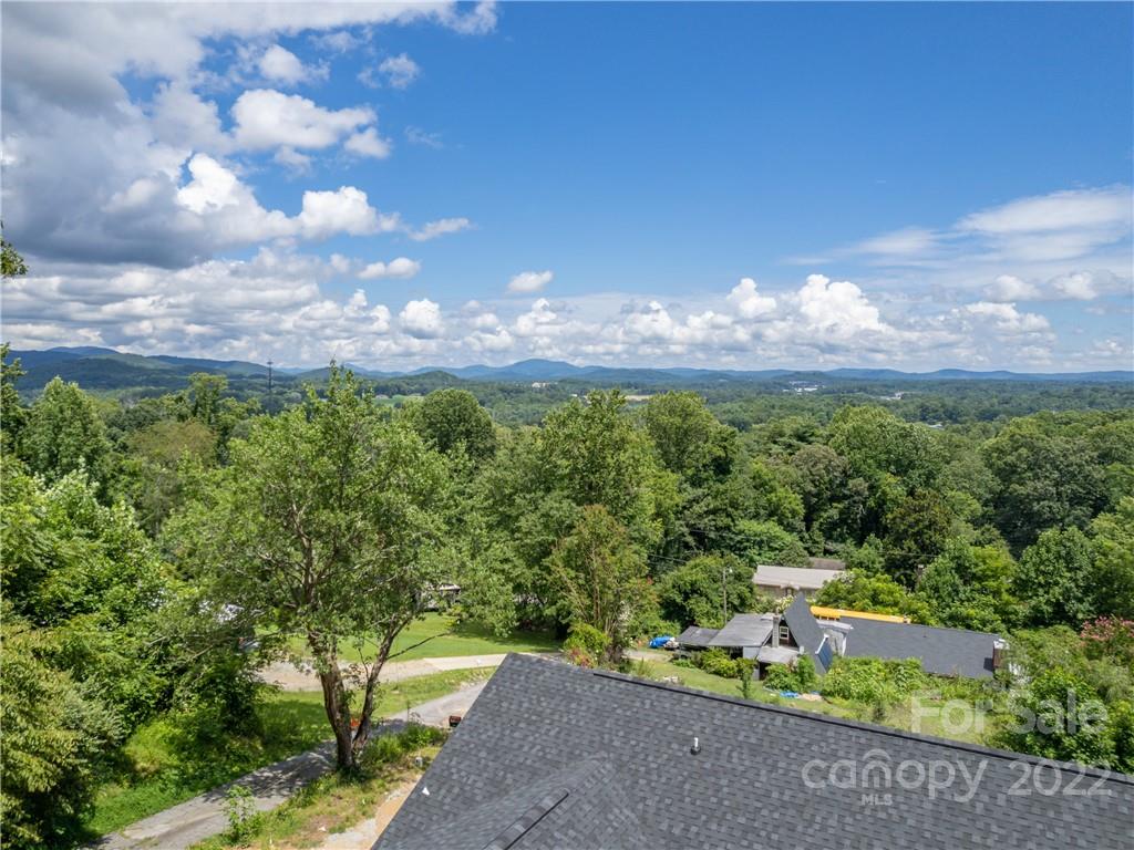 39 Hamilton Acrs Drive Tryon, NC 28782 - Photo 22 of 25 a view of a street with houses in the back