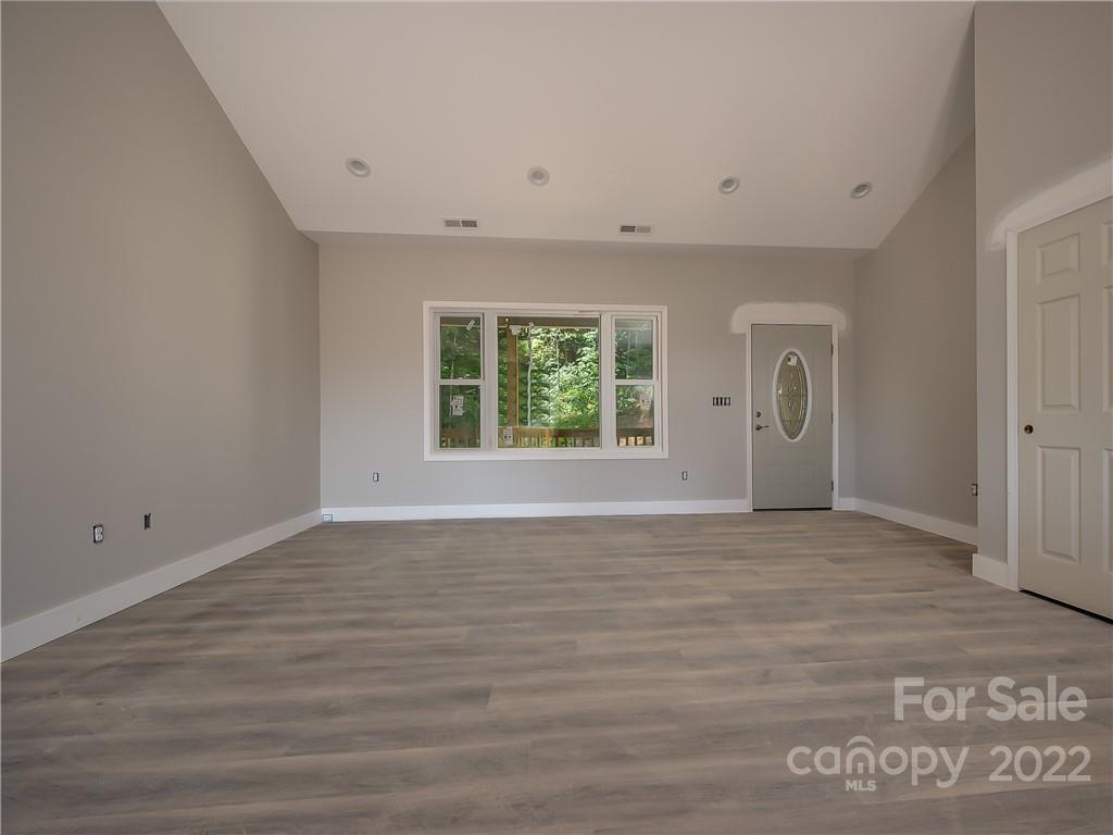 39 Hamilton Acrs Drive Tryon, NC 28782 - Photo 3 of 25 a view of an empty room with a window
