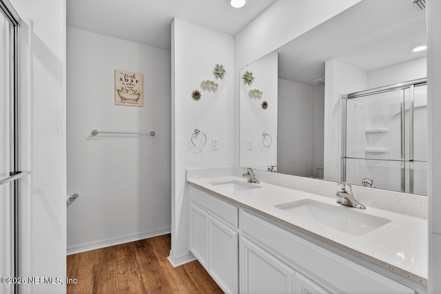 2 Radium Lane Palm Coast, FL 32164 - Photo 13 of 22 a bathroom with a double vanity sink and mirror