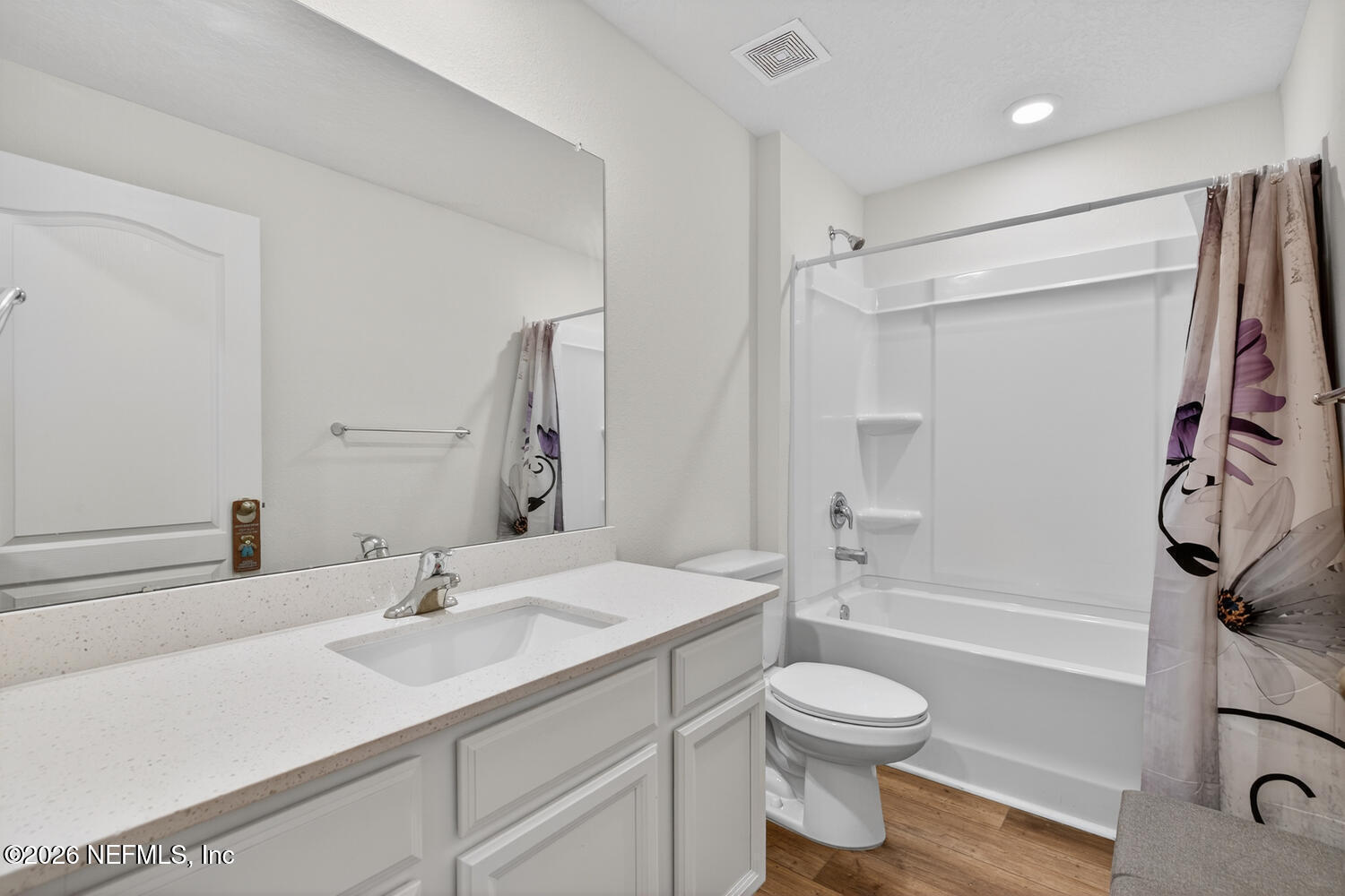 2 Radium Lane Palm Coast, FL 32164 - Photo 20 of 22 a bathroom with a sink toilet a mirror and shower