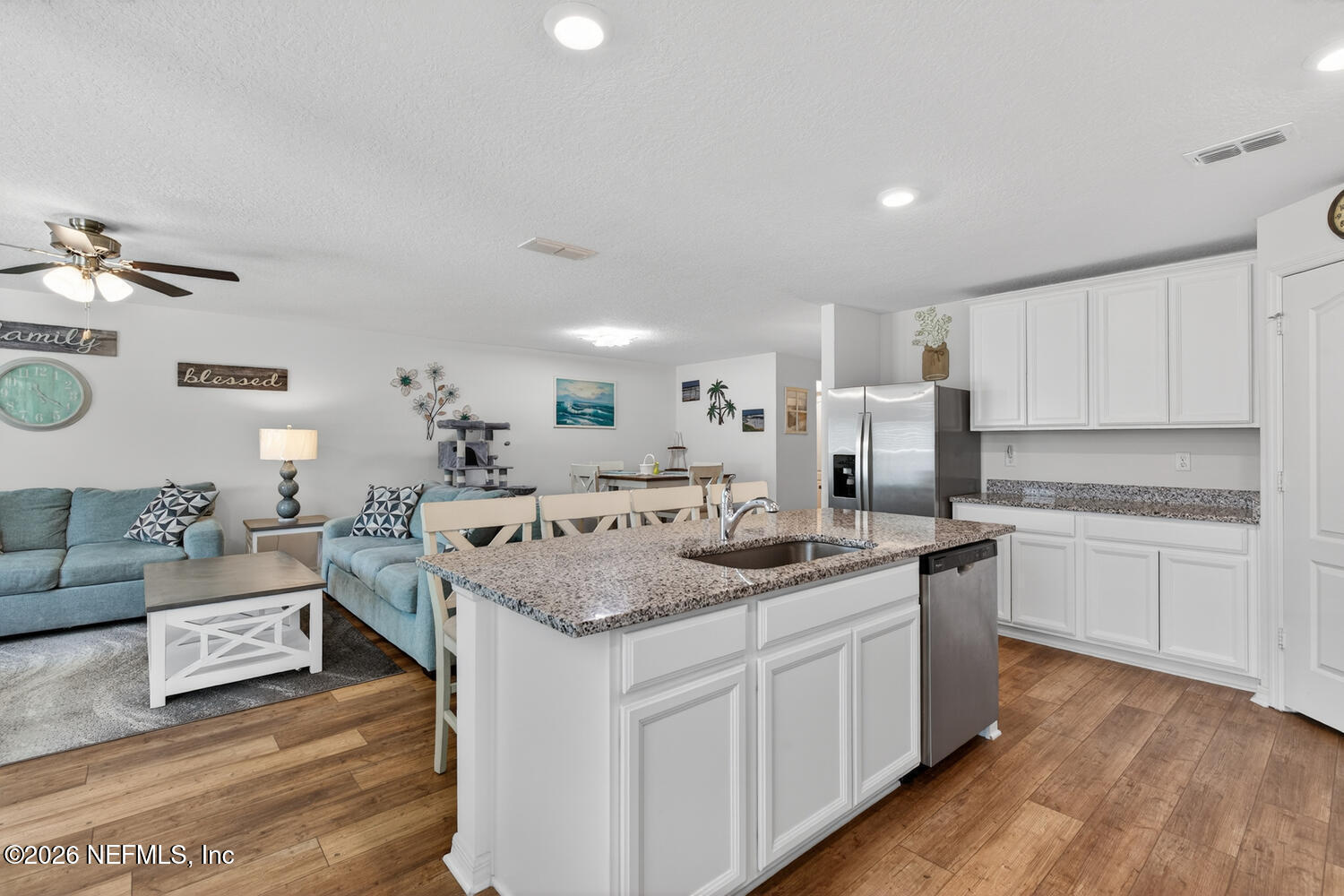 2 Radium Lane Palm Coast, FL 32164 - Photo 10 of 22 a kitchen with a sink stove and cabinets