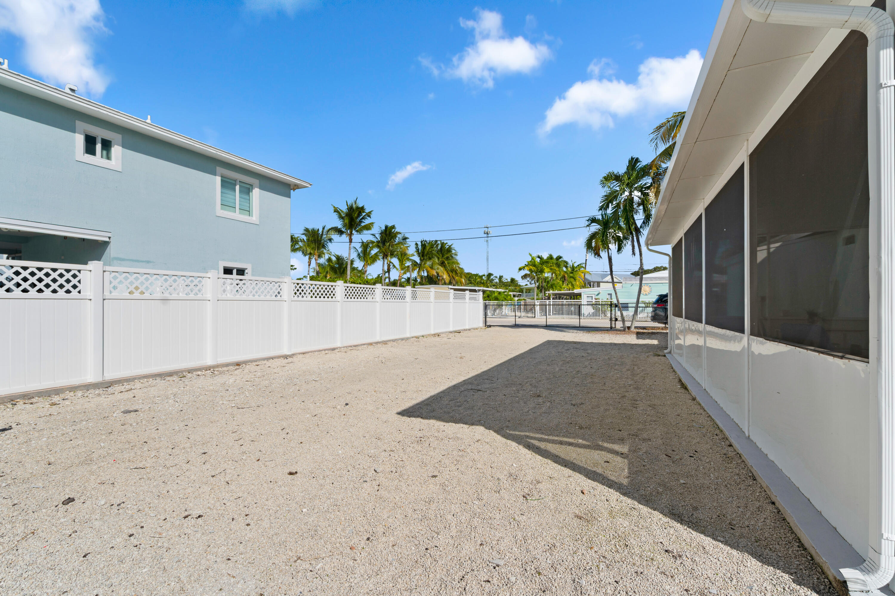 314 Windley Road Key Largo, FL 33037 - Photo 24 of 36 a view of a back yard of the house