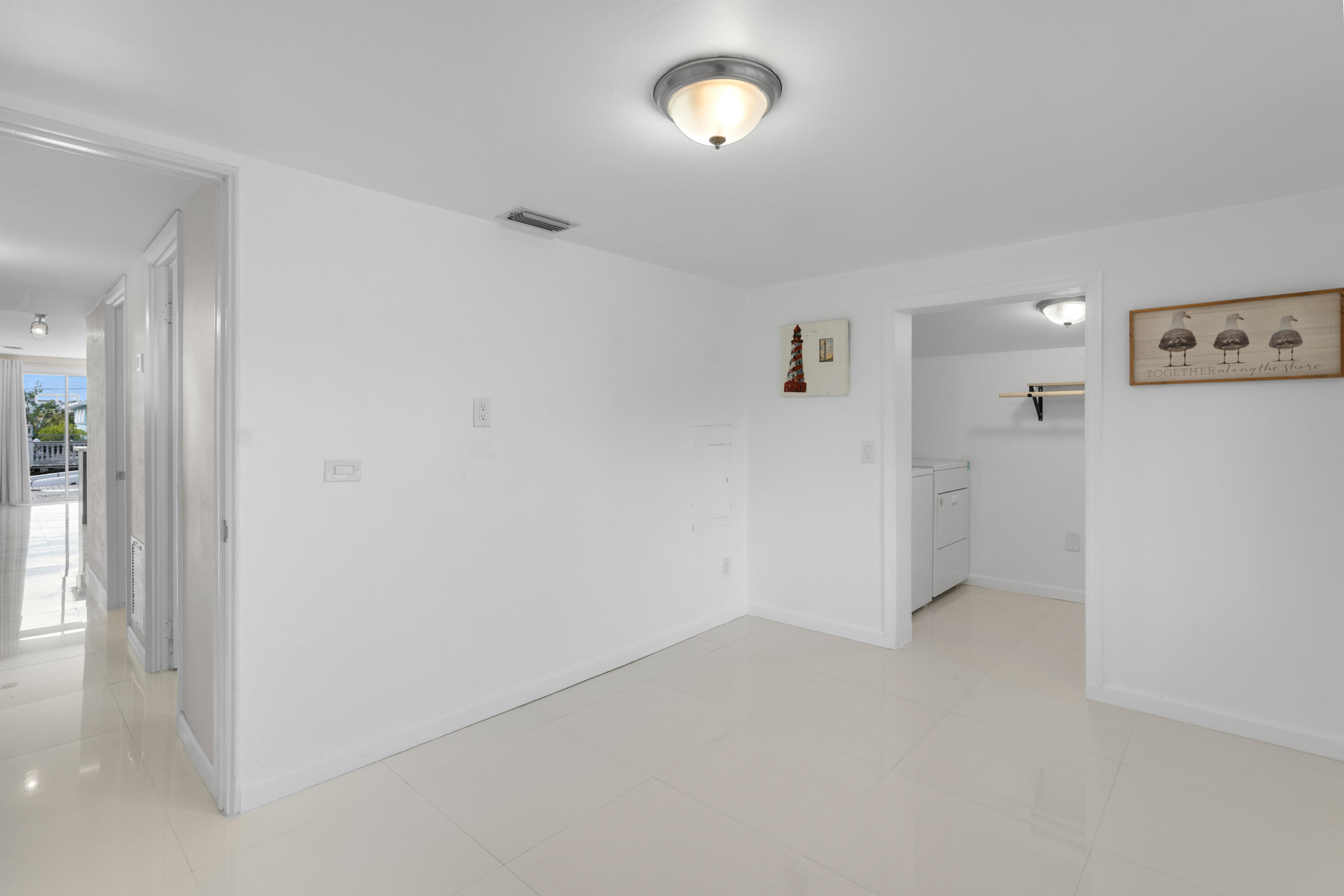 314 Windley Road Key Largo, FL 33037 - Photo 29 of 36 wooden floor in an empty room
