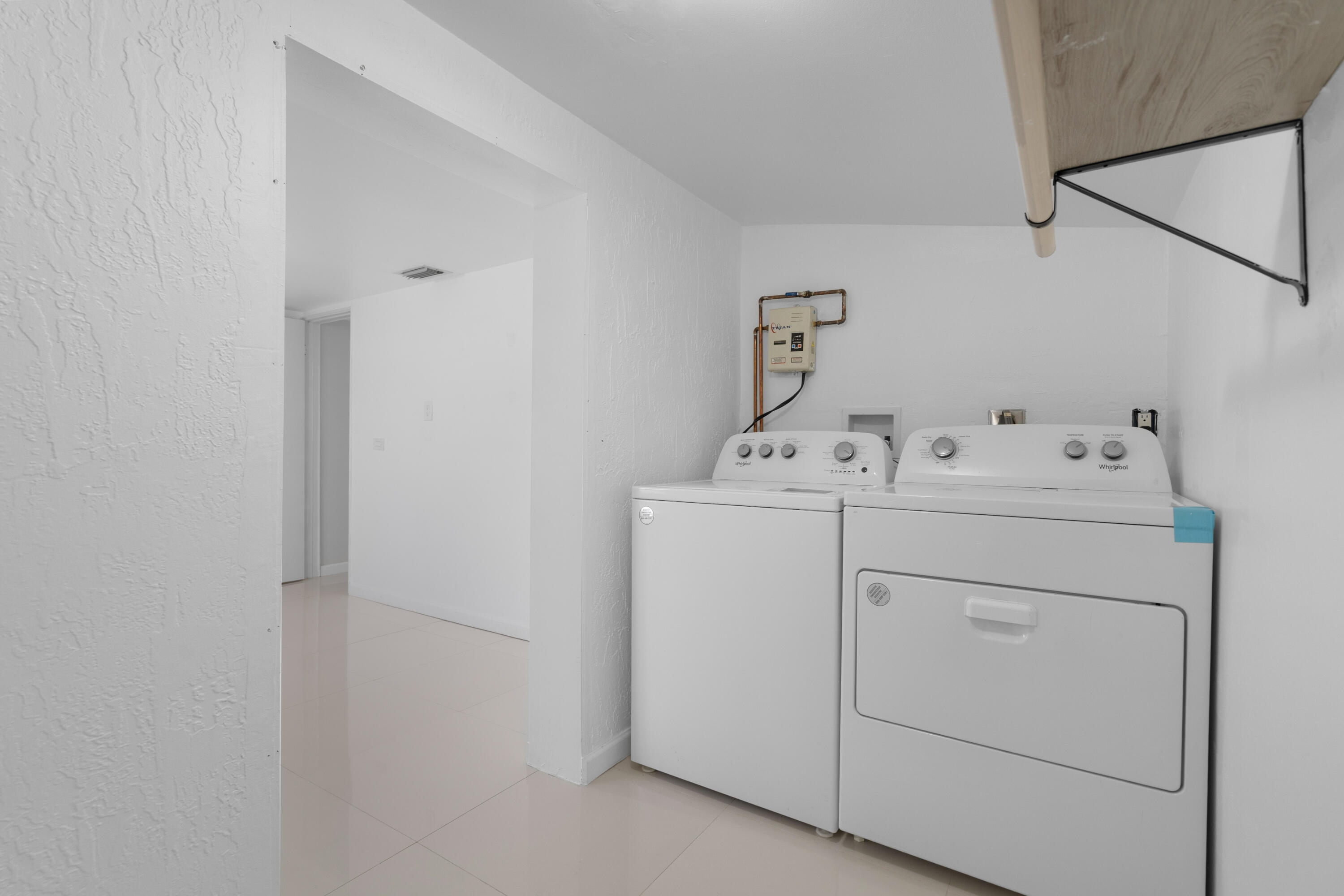 314 Windley Road Key Largo, FL 33037 - Photo 33 of 36 a utility room with dryer and washer