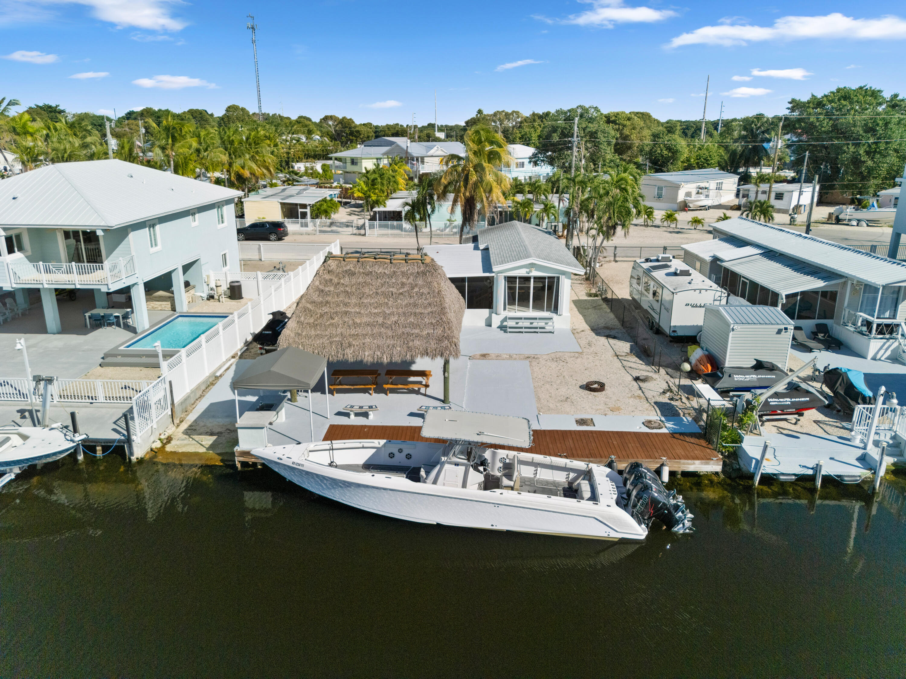 314 Windley Road Key Largo, FL 33037 - Photo 9 of 36 a picture of houses with outdoor space
