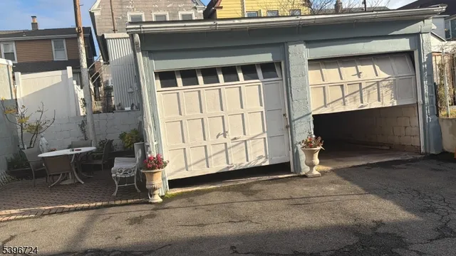 a view of a house with a door and a chair