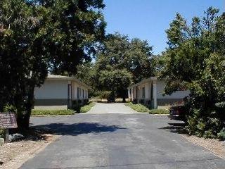 129 West Mark Springs Road Santa Rosa, CA 95404 - Photo 2 of 3 a house that has a tree in front of it