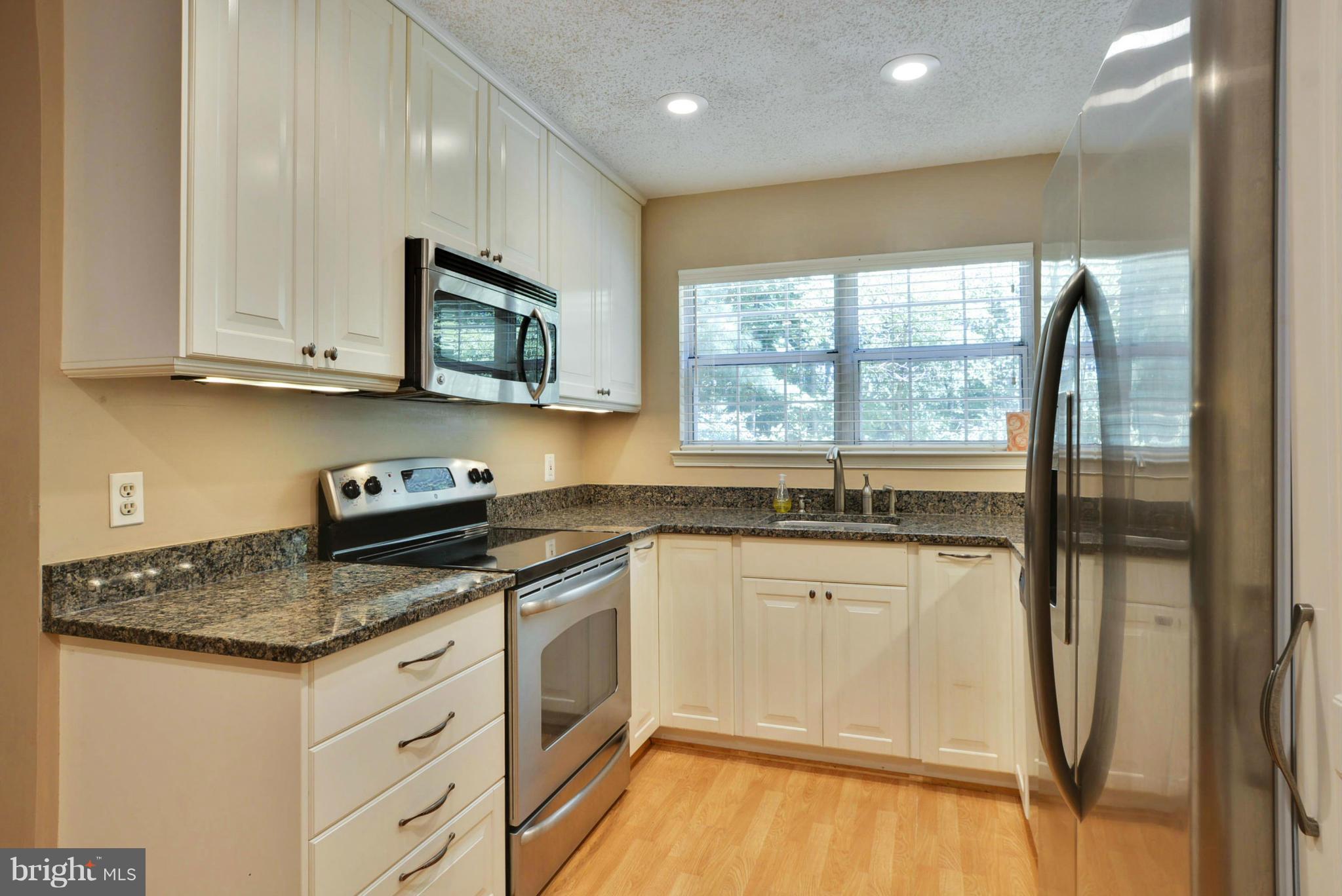 12010 Golf Ridge Court, Unit 102 Fairfax, VA 22033 - Photo 2 of 29 Kitchen has Granite Counter Top