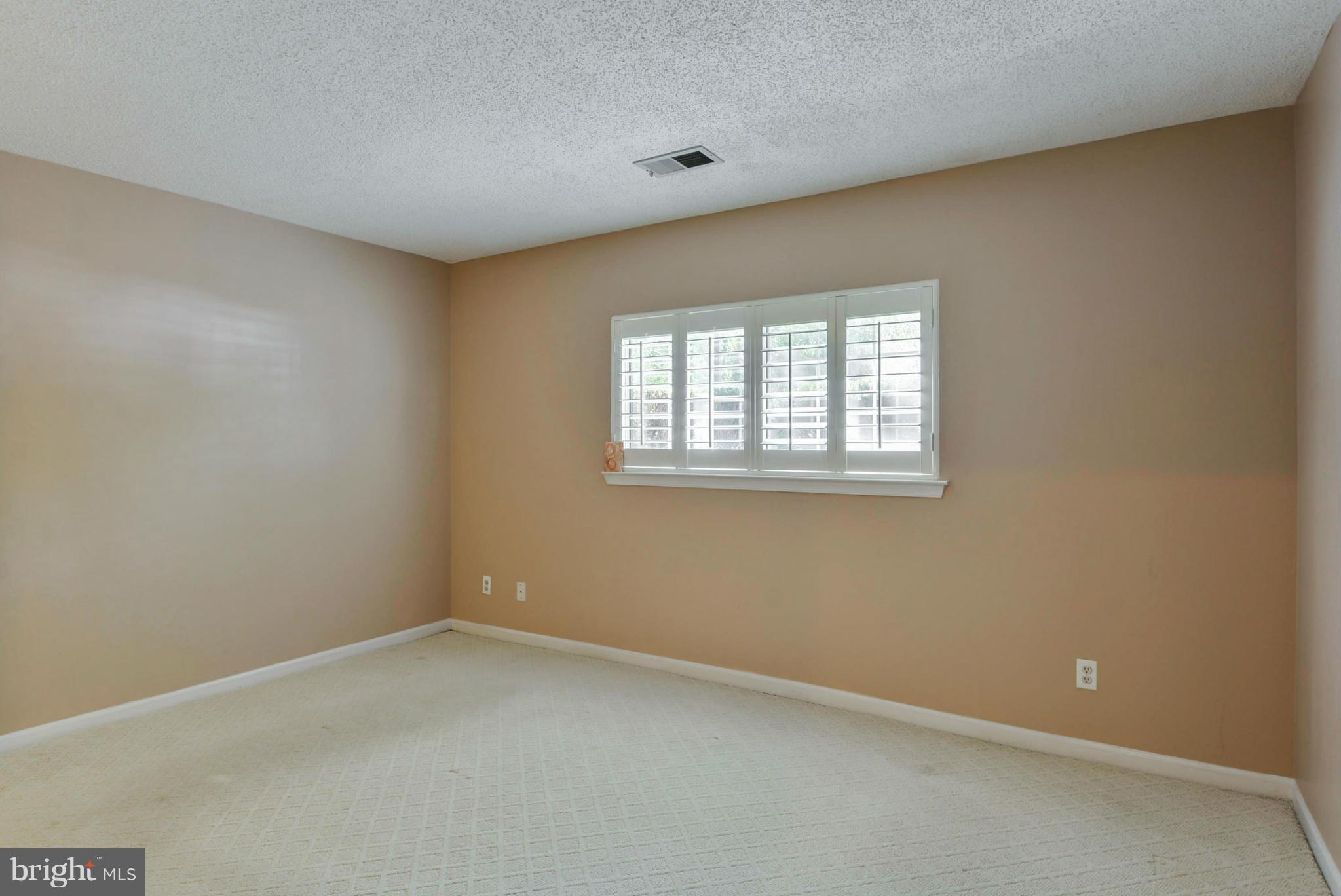 12010 Golf Ridge Court, Unit 102 Fairfax, VA 22033 - Photo 12 of 29 Owner's Bedroom