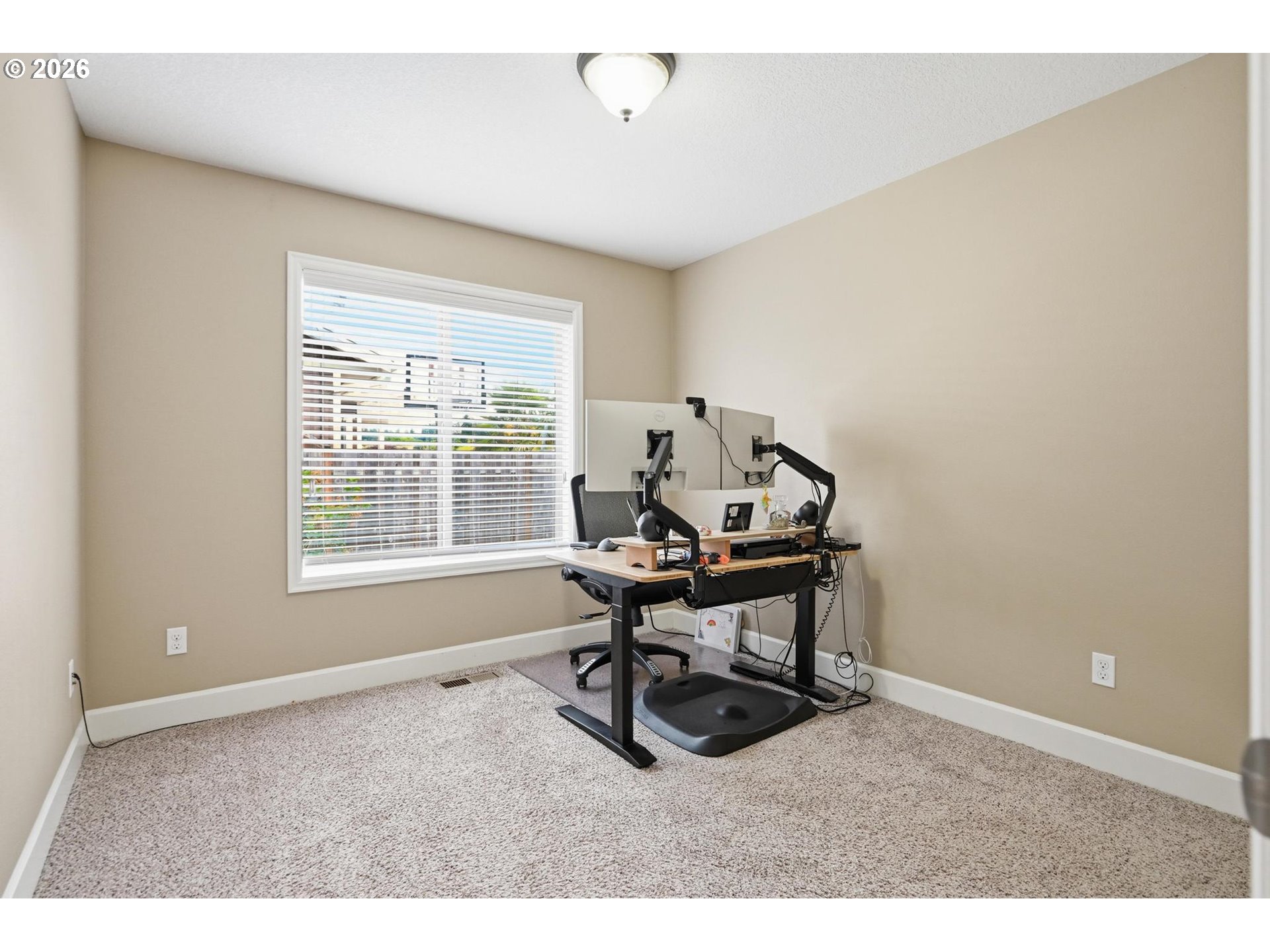 1075 Sage Street Silverton, OR 97381 - Photo 14 of 46 a workspace with furniture and a window