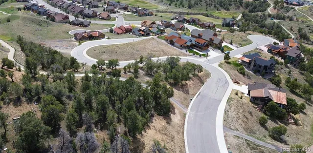 a view of backyard with green space