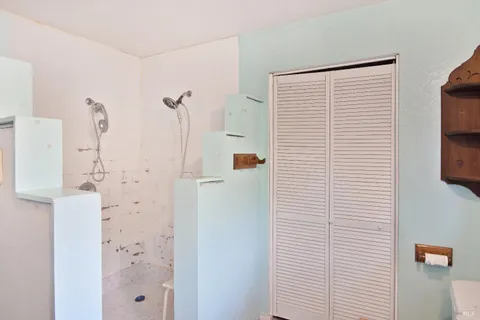 a view of a bathroom with shower