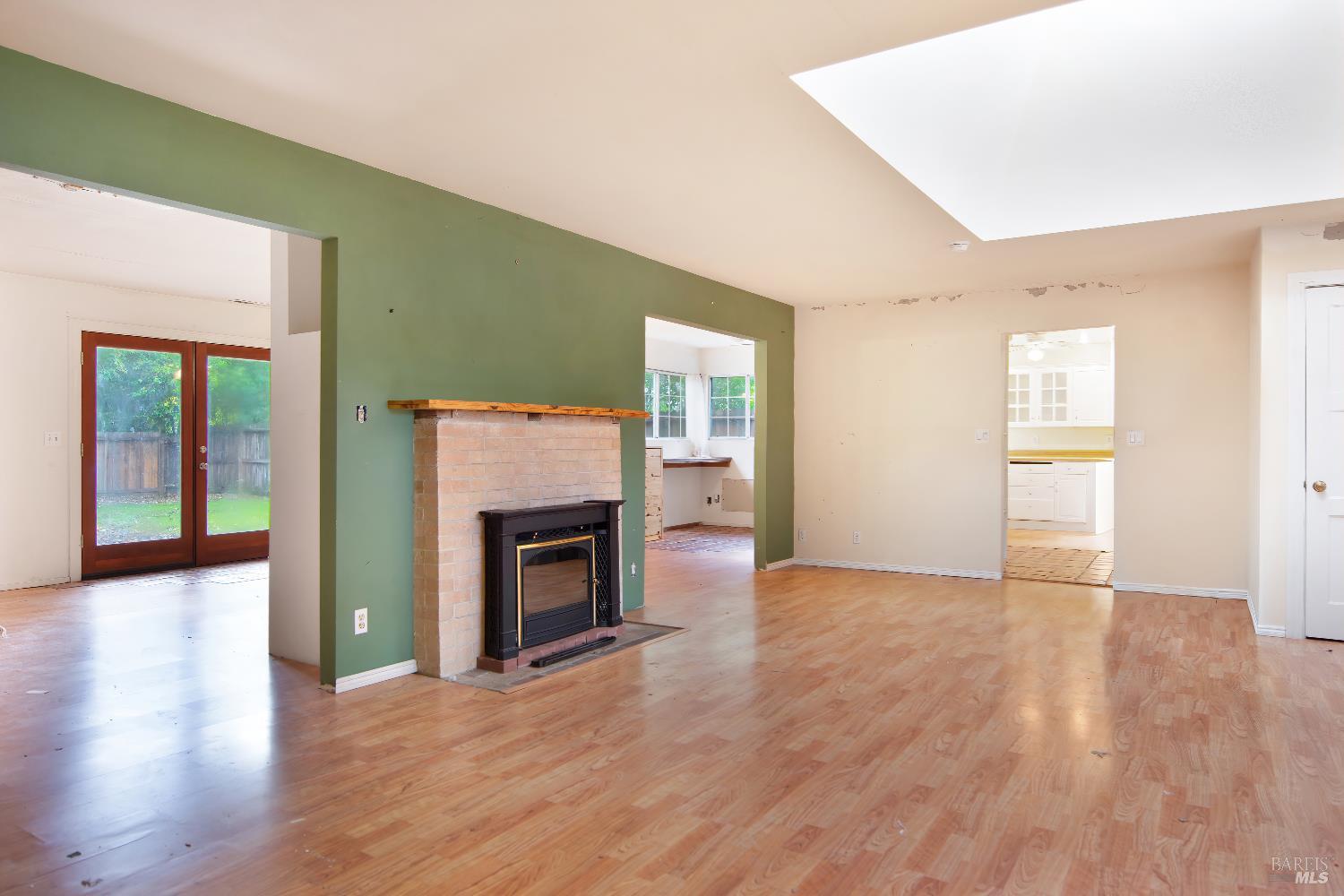 700 Cecelia Drive Glen Ellen, CA 95442 - Photo 3 of 13 a view of an empty room with window and fire place