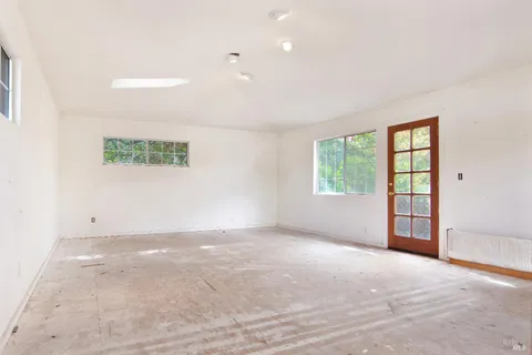 an empty room with windows