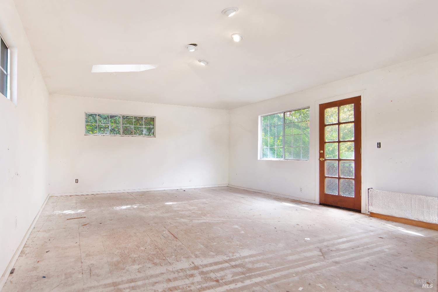 700 Cecelia Drive Glen Ellen, CA 95442 - Photo 7 of 13 an empty room with windows