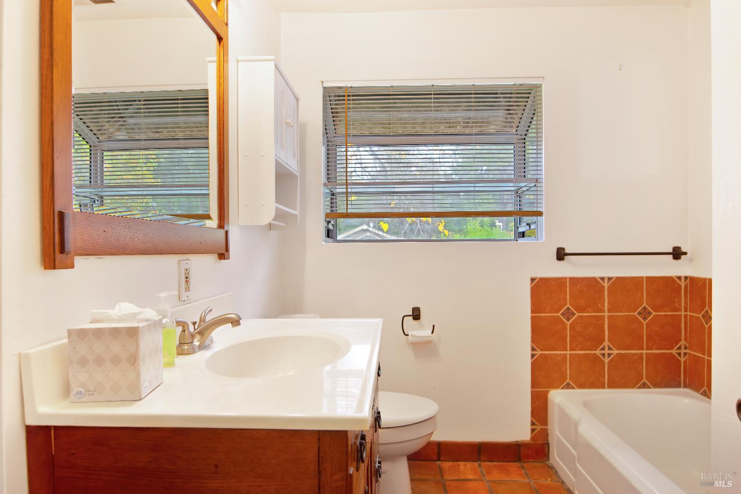 700 Cecelia Drive Glen Ellen, CA 95442 - Photo 10 of 13 a bathroom with a sink and a bathtub