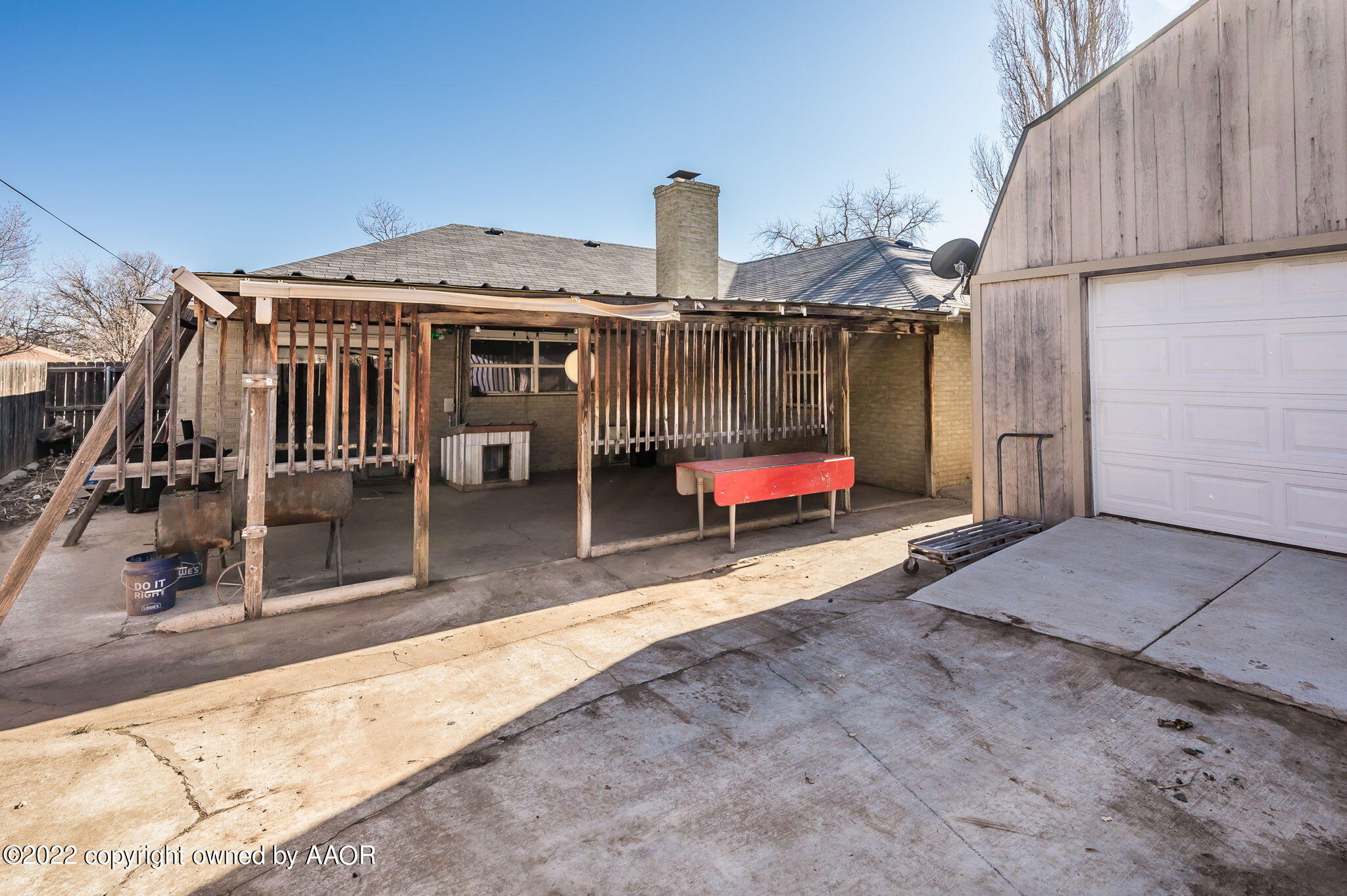 5110 Shawnee Trail Amarillo, TX 79109 - Photo 21 of 22 a view of a terrace with chairs and a barbeque