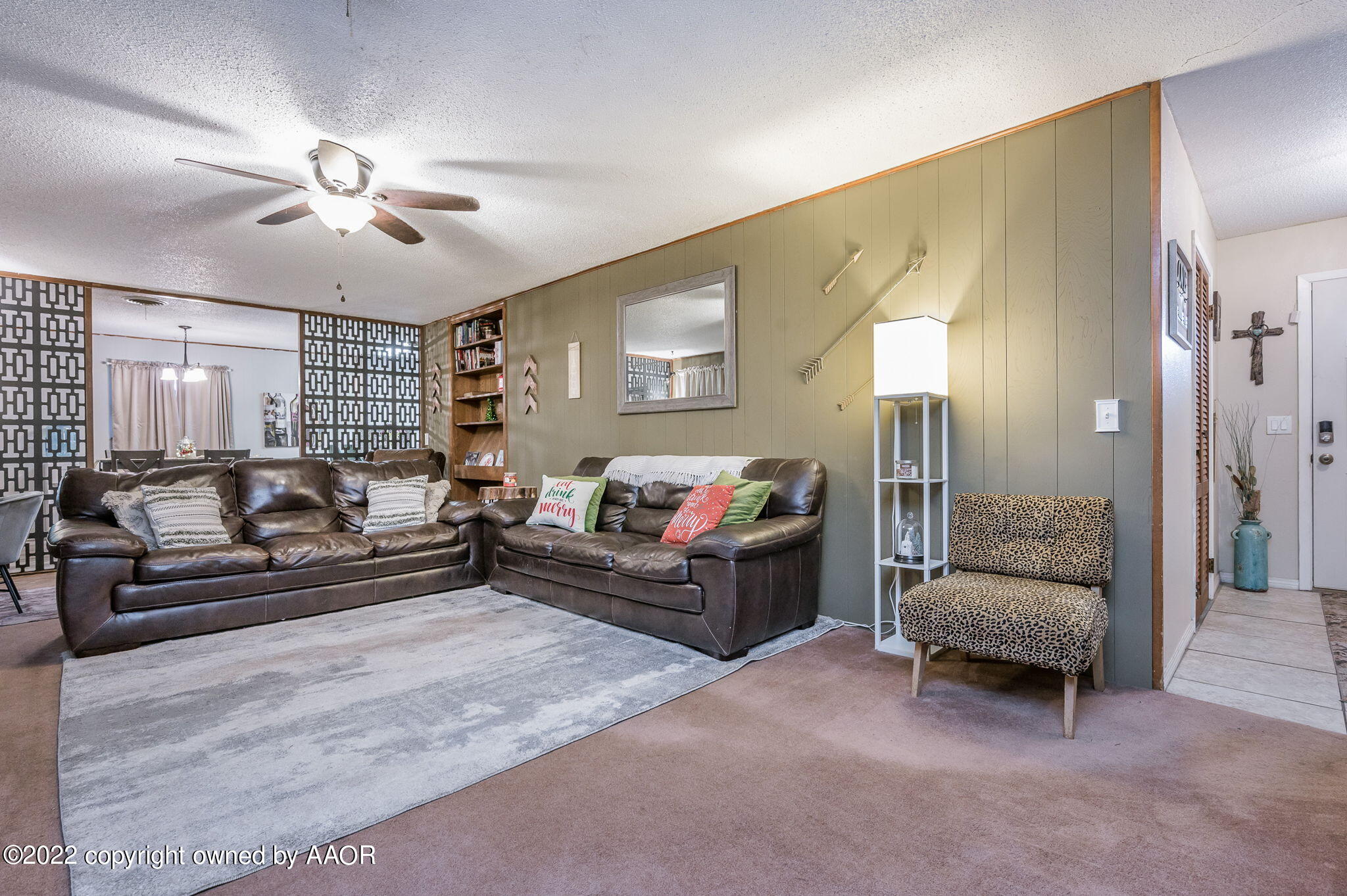5110 Shawnee Trail Amarillo, TX 79109 - Photo 6 of 22 a living room with furniture and a chandelier