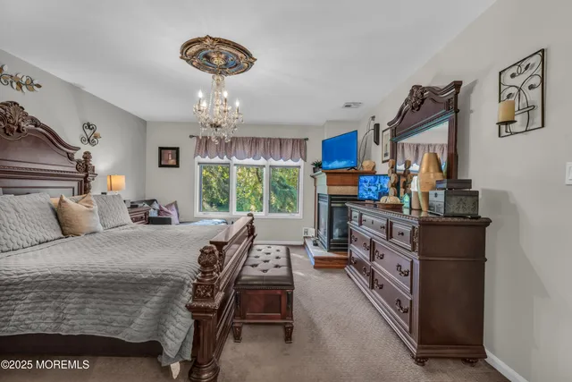 a view of a bedroom with a furniture and entryway