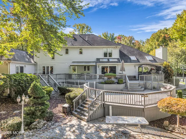 a view of a lounge chair in the backyard