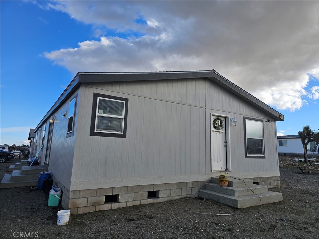 a backyard of a house with seating space
