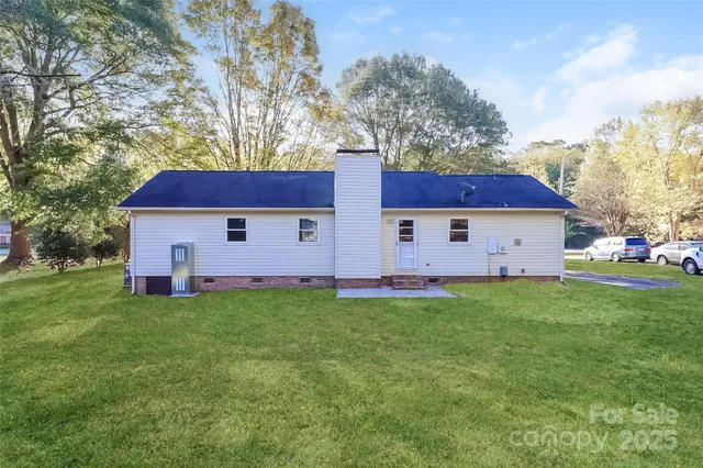 a house view with a garden space