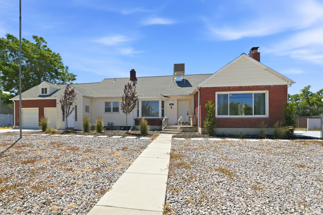 220 East Greenwood Avenue Midvale, UT 84047 - Photo 1 of 46 Single-story residence featuring a brick facade and white siding
