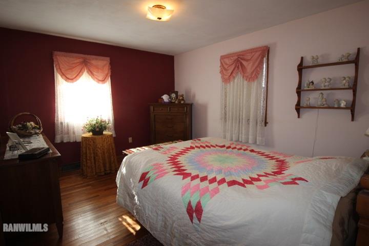 7559 West Dublin Road Freeport, IL 61032 - Photo 14 of 22 a bedroom with a bed and a window